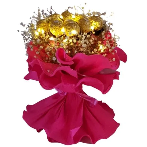 Ramo de flores con rocher y leds fucsia 